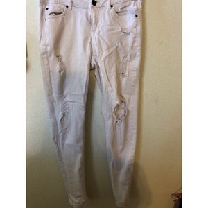 Distressed white denim